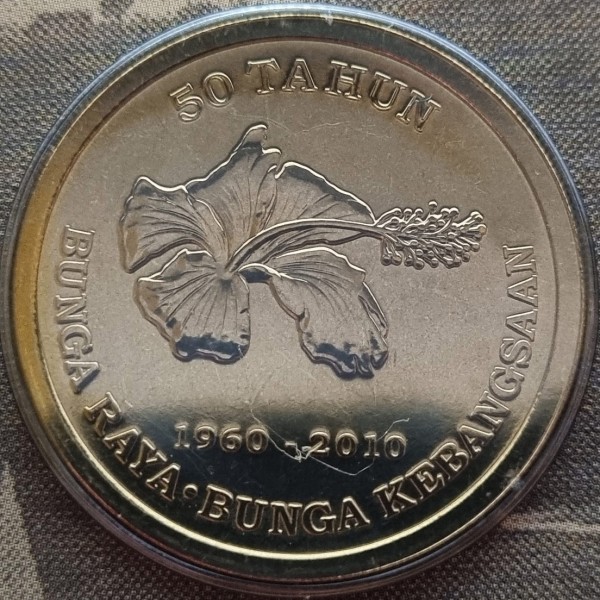 1 ringgit , Malàisia (50è aniversari - Proclamació de la Bunga Raya como Flor Nacional)